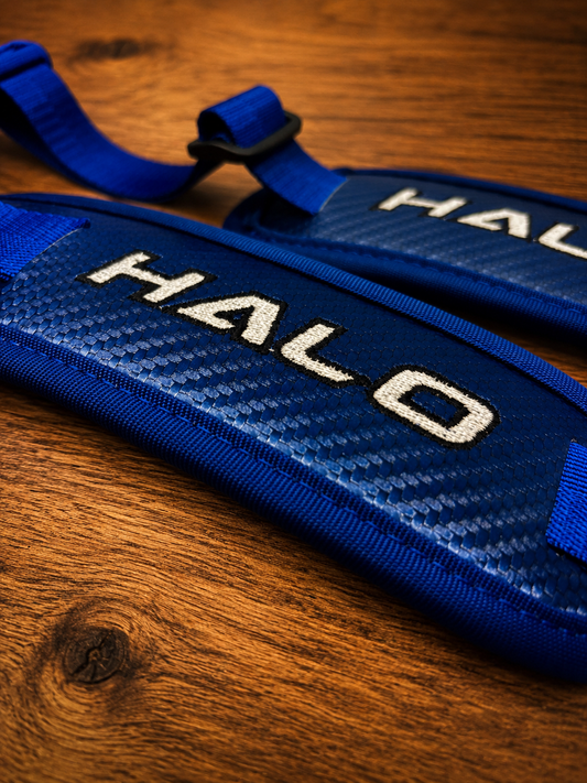 Closeup of blue Halo Hockey Rotation Doctor goalie pad straps