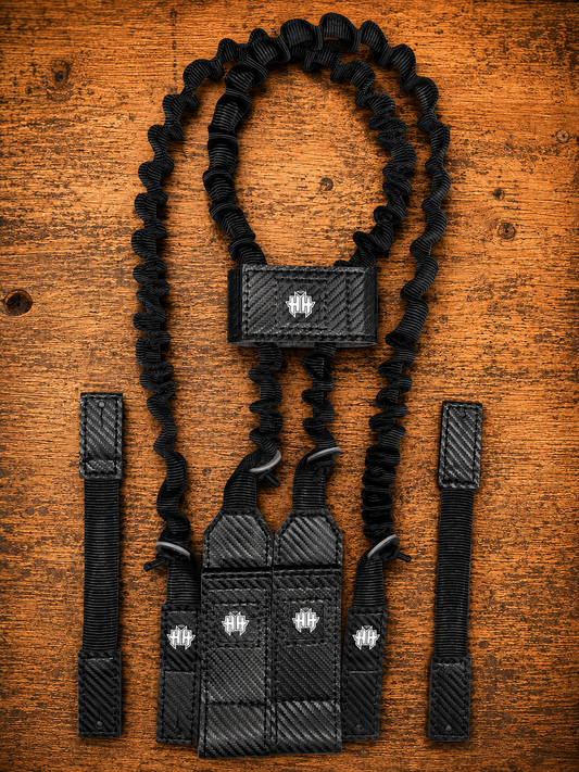 Top kit view of black Halo Hockey Suspenders 2.0 goalie bungee suspenders shown with center strap option