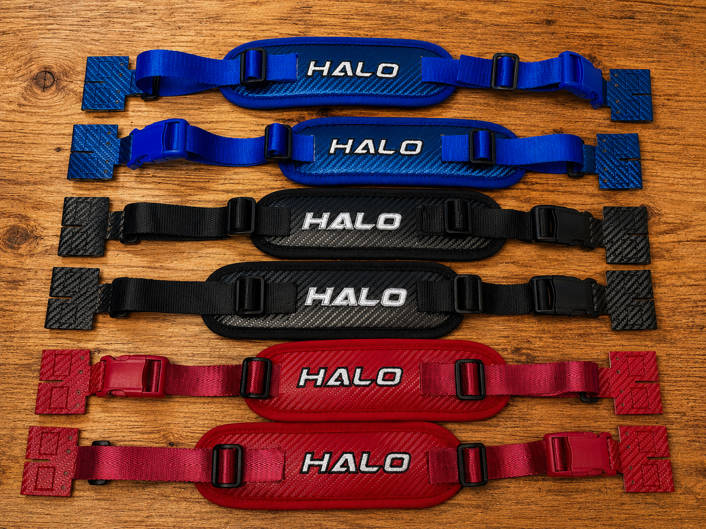 Halo Hockey Rotation Doctor goalie pad straps shown in blue, black and red color options