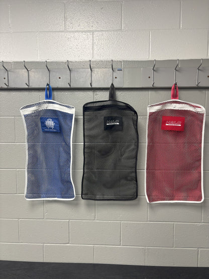 All 3 color options of Halo Hockey Stinky Boy Laundry Bags shown hung side by side on locker room hooks
