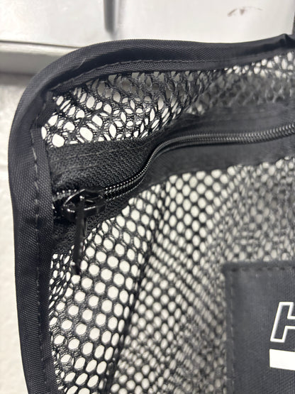 Closeup shot of the binding and zipper area of a black Halo Hockey Stinky Boy Laundry bag