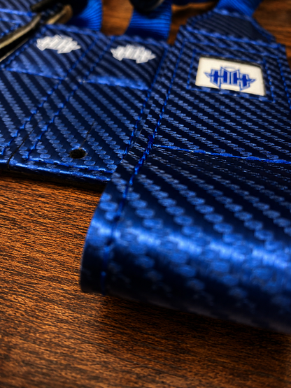Closeup detail of front logo panel on blue Halo Hockey Suspenders 2.0 goalie bungee suspenders